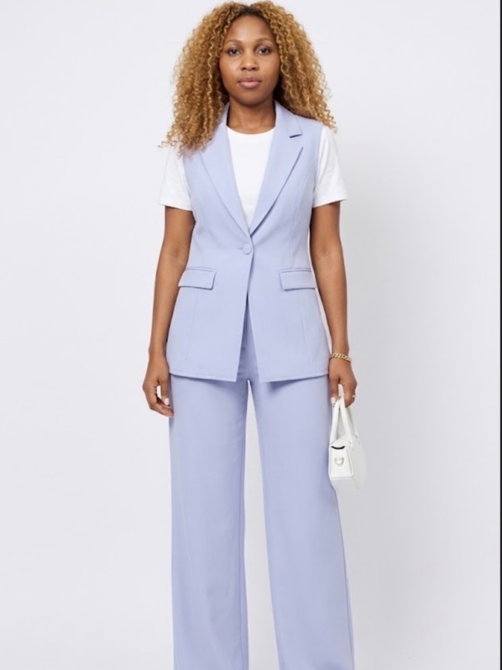 Elegant suit vest and pants with pockets perfect for casual wear going out